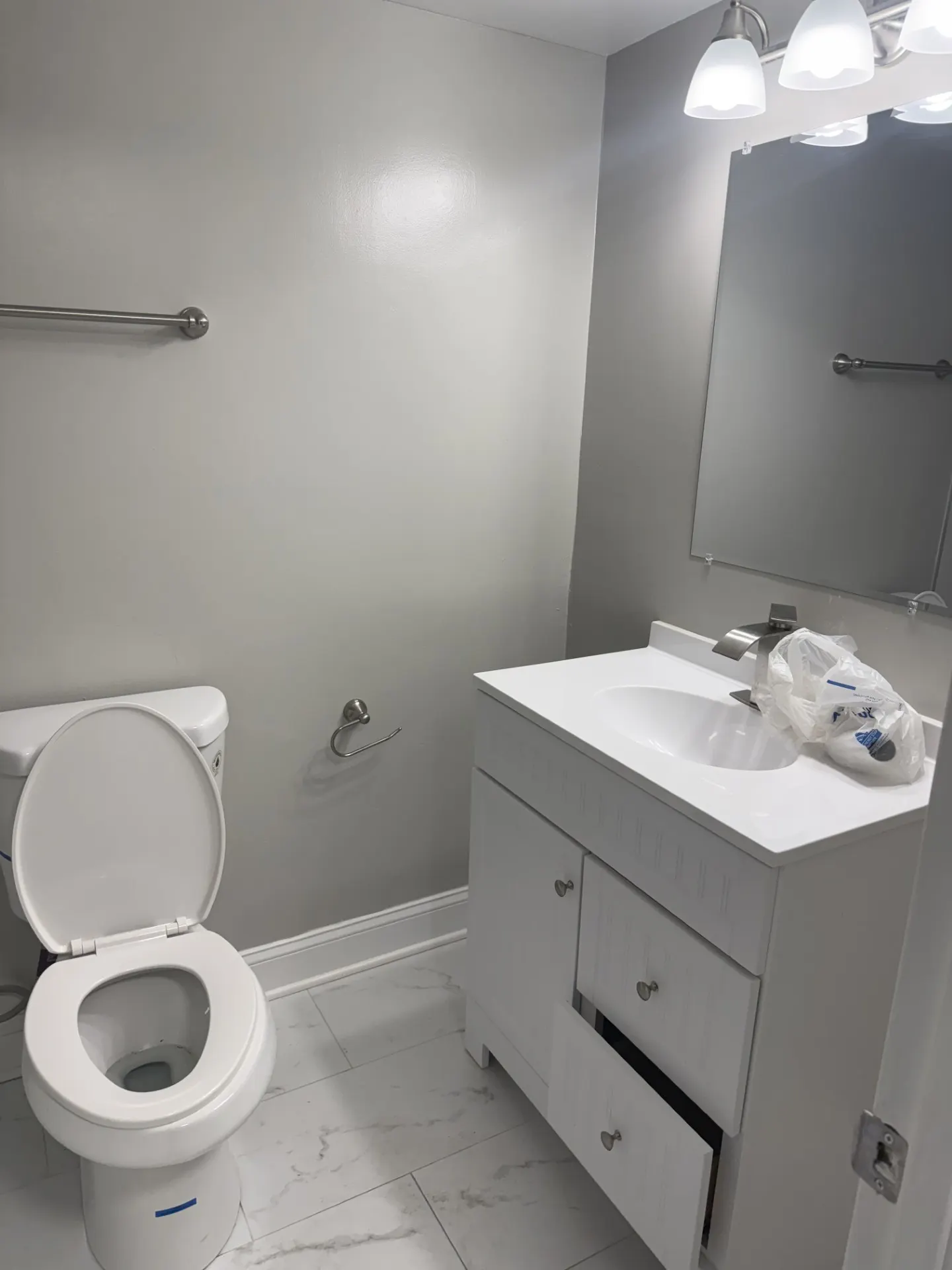 Bathroom vanity and mirror, newly installed